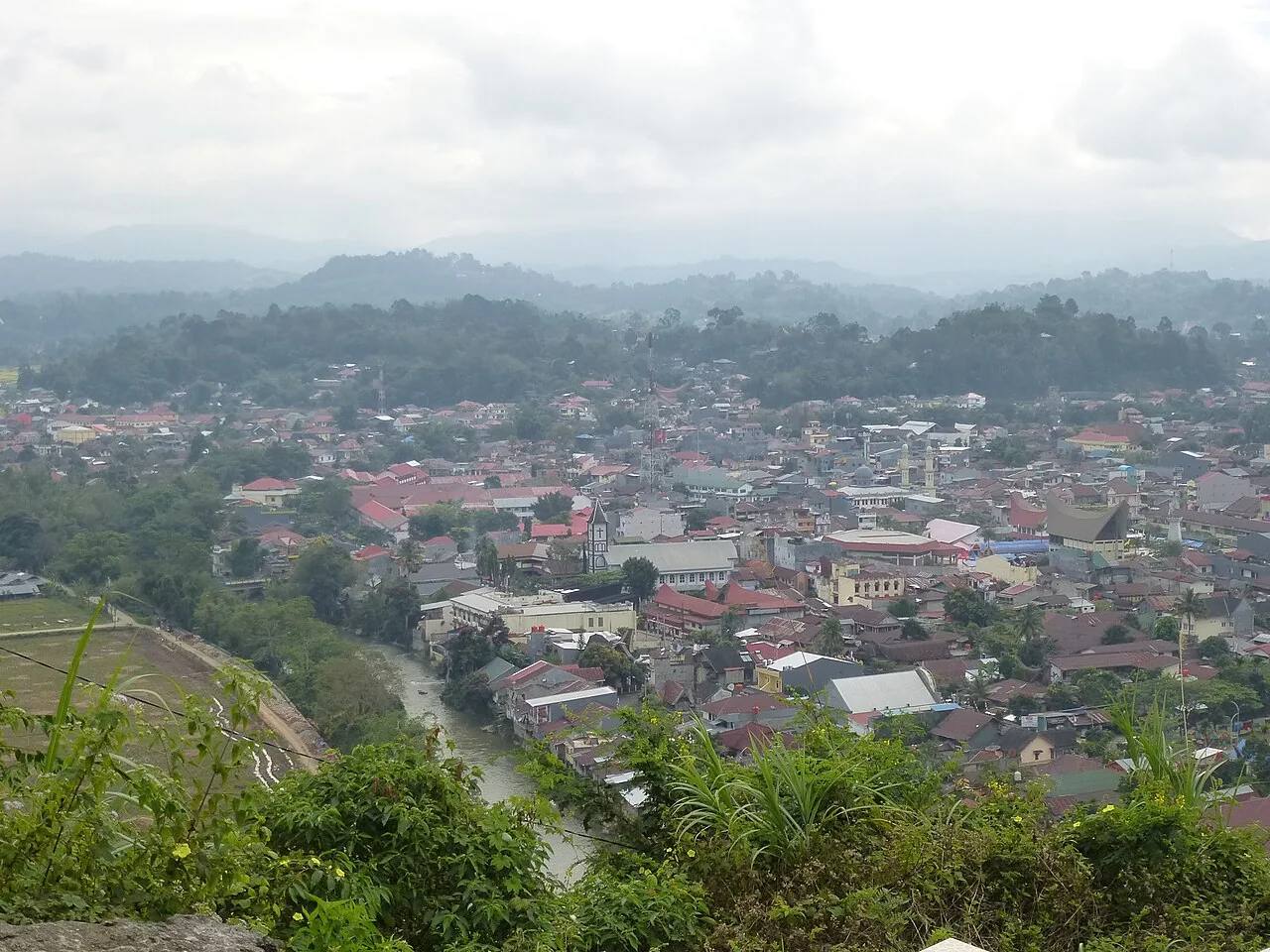 Rantepao town spread across a green highland valley